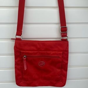 Orange designed Coach cross-body purse